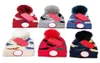 Bambini Dinosauro Cappelli lavorati a maglia Lettera di moda Pompon Berretti Ragazzi Ragazze Pom Pom Cappellini con teschio Cofano per bambini CANADA Designer Maglieria B1451872