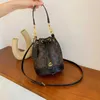 Estilo ocidental feminino 2023 nova moda portátil balde versão grande capacidade único ombro textura hardware crossbody saco 5478