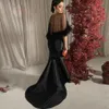 Svart stropplösa sjöjungfruklänningar med Feather Cape Asymmetrical Train Formal Evening Party Gown