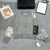 Loewee-Pullover, Designer-Mode, Damenpullover, Frühherbst, neuer Pullover mit Rundhalsausschnitt, altersreduzierende Strickjacke, gespleißtes Jacquard-Strickwaren-Manteloberteil