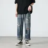 Jeans da uomo strappati gamba larga moda retrò larghi Harajuku uomo streetwear pantaloni larghi in denim dritto con foro hip-hop da uomo