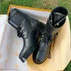 Botas de grife com letras de metal rotativas de luxo, marca francesa, sola grossa, à prova d'água, botas martin novas, couro genuíno, sola grossa, botas de neve antiderrapantes