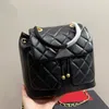 Sac à dos à rabat classique pour femmes avec emblème de matériel doré treillis de diamant matelassé en cuir de vachette porte-monnaie sac à main valise tendance Pochette pochette de soirée 22CM