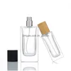 Bouteilles de parfum en gros vaporisateur en verre de forme carrée par bouteilles 30 ml 50 ml 100 ml vide bouteille rechargeable bureau de livraison directe Dhgarden Dh5Ay