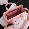 Kvinnor Designer Tote Bag Crossbody Bag Högkvalitativ Cross Grain Cowhide Luxury Shoulder Handväskor Tre i en Saffiano Bag Pink Designer Bag Mini Tote Fashion Simple