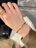 Tifanism Populära lyxdesigner Armband Premium Rose Gold Half Diamond Knot Armband Twisted Small and Luxury Jewelry with Original Box
