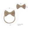 Haaraccessoires Babymeisjes Elastische booghoofdband vaste kleur bowknot band tulband zacht katoenen hoofddeksels voor geboren H055