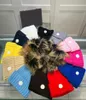 Gorro de diseñador Gorro de punto de invierno Gorro de lana Mujer Punto grueso Grueso Cálido Gorros con pompón de piel sintética Gorros Gorros para mujer Gorros 12 8031376