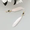 ぶら下がりイヤリング日本と韓国の小さなタッセル耳クリップスーパーイモータル羽長いペンダントシンプルな気質レトロファッションジュエリー