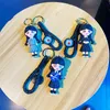 Onsdag Addams animerade Addams Family Acrylic Keychain Doll Pendant Decoration Derivat Perifera produkter Tillbehör