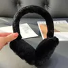 Cuffie antirumore da donna invernali in vero shearling per ragazze, per un simpatico fiocco scaldino per le orecchie, regalo morbido per esterni