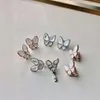 Pendientes de diseño Vans Cleef para mujer, Clip de oreja de mariposa con encanto de calidad Original, oreja de estilo femenino Simple y dulce con oro rosa