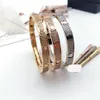 Pulsera de diamantes completa de 3 filas de acero de titanio Moda Mujer Hombre Brazalete de Navidad Pulseras Distancia Joyería Regalo con bolsa de terciopelo 246W