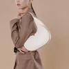 Sacs de soirée sous les bras pour femmes en cuir souple Bolsas Feminina sac à bandoulière portable petit circulaire Bolsos Mujer sacs à main de couture simples