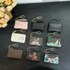 Illustre Xmas Charm Key Holder Bolsos de diseño clásico mujer Monedero carteras de diseñador bolso Llavero Anillo LLAVE POUCH mujeres pequeños monederos con cremallera Cartera