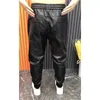 Men Lederen broek Elastische taille Faux Joggers Zipperzakken Zwart Streetwear Slim Pencil Pant Clothing 231225