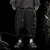 Брюки Techwear Джоггеры для мужчин Черные брюки в уличном стиле с регулируемым краем и множеством карманов