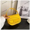 Damen Fashion Handtasche Store Dieel Dingdang Bag Pu neue Sättel High -End -Luxus -Handtasche Kleine Schulter -Crossbody -Geldbörse