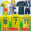 23/24 Al NASSR FC Soccer Jerseys Ronaldo 2023 2024 Home Yellow Away Cr7 Gonzalo Mane Martinez Talisca Women Fans Player الإصدار الرجال Kids Kids Football Shiirt