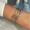 Armreif 2024 Hohe Qualität 3 Farben Welle Twisted Band Stapeln Armband Pflastern 5A Zirkonia Bling Frauen Mode Party Schmuck