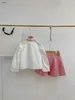 Luxe trainingspakken voor meisjes Groene edelsteen strikversiering kinderkostuums maat 110-160 Wit overhemd en rok met volledige print Dec20