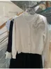 Kvinnors stickor 2023 Kvinnor Cardigan Solid Sweater Thin Heavy Industry Pärögd Bow Fashion O-Neck Långärmning Kort kappa