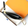 2024 Kvinna Mens plånböcker Designer Plånbok Korta plånböcker Mynt Purses Luxury Purse Card Holder Canvas Leather Key Chain Flowers Top