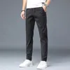 Koreański styl mężczyźni Casual Spodnie cienki lato regularne spodni ładunkowy splatyczne talia czarne spodnie moda szary czarny khaki 883 231226