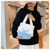 Nuova borsa da donna in peluche Kuromi carina ed esplosiva, borsa da esterno versatile con melodia di cartoni animati dolce coreana