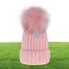 2021 Adultes Épais Chapeau d'hiver chaud pour femmes Câble extensible doux tricoté Pom Poms Bonnets Chapeaux Femmes Skullies Bonnets Fille Casquette de Ski 8449732