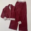 Spacchi di tracce di modelli da donna pantaloni top a maniche lunghe da donna 2 pezzi set con giacca zip a strisce 25783