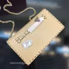 Designer Velentino Light Red 2024 Chain Bag Luxury Bags Baguette Rivet Hand Grab Women's Letter Crossbody Versatile Square Hand Purse läder EE26ulxm