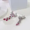 Europe America Style Luxury Femmes Lady Silver Color plaquée incrustée rouge vert cubic zircon bowknot boucles d'oreilles étouffantes 231227