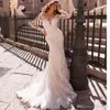 스튜어닝 브리드 2024 섹시한 흰색 레이스 인어 웨딩 드레스 새로운 깎아 지른 메쉬 탑 긴 소매 분리 가능한 치마를 가진 아플리케 신부 가운