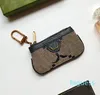 2024 NYTT STRA NYA LITA SMALLA Byt väska Röd kuvert Classic Womens Wallet KeyChain Luxury Coin Purse Designer för Women Men