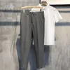 Męskie spodnie wiosna letnia kostka mężczyźni szczupli robota jogging społeczny kombinezon formalny spodnie męskie marka khaki czarna Korea plus size 40 42