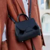 Designer feminino numero un nano bolsa de ombro bolsa de retalhos de couro com uma base que não é fácil de sujar carteira com padrão de lichia