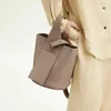 Sacca da songmont lune ha maniglia cesto cesto cesto crossbody borse borse borsetto designer spalla hobo spalla assillare sacchetti di lusso borse di lusso sacchetti mezzaluna in pelle