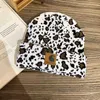 Carharttly chapeau noir et blanc rétro mode motif de vache chapeau tricoté automne et hiver couples polyvalent imprimé léopard chapeau froid femmes