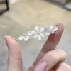 Clipe de sapo olho de gato de cristal de strass de vendas diretas do fabricante, versão coreana clipe de cabelo moderno e elegante, sofisticado e nicho