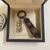 Keychain en cuir délicat de concepteur de luxe de luxe Kelemper en alliage zinc en argent LEART UNISE