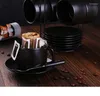 Tazze Tazza da tè in ceramica con piattino Set da caffè in porcellana pigmentata nera Tazza da ufficio aziendale di lusso premium