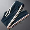 Otoño invierno pantalones para hombre hombres diseñador correas pantalón casual largo pantalón moda lujo joggers pantalones hip hop monopatín streetwear pantalón tamaño asiático m-4xl