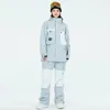 Homem e mulher neve wear à prova dwaterproof água terno de esqui conjunto snowboard roupas ao ar livre trajes à prova dwaterproof água jaquetas de inverno calças unsex 231227