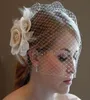 Elegant Champagne Flower Birdcage Veil Veil Bridal Chapeaux Coureurs avec peigne Head Pièce Accessoire 8823398