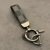 Keychain Designer Metal Key Horseshoe Keychain Lovers Car Men de porte clés fait à la main