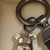 Läder nyckelring delikat lyxbjörndesigner nyckelring zinklegering silver bokstav unisex lanyard söt kvinnlig-manlig mode nyckelring