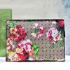 Borsa per trucco per lavaggio unisex frizione da donna Lettera di moda Stampa cluster Flower Gluster Cowhide autentica Leathe di alta qualità con cerniera aperta