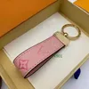 2024 Med Box Top Quality Mens and Womens Fashion Car rostfritt stål läderdesigner Keychains