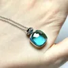 Nudo Pendant Necklace For Women Inlay Zircon med Blue Topaz Pendant Parfym Bottle Shape Elegant Fashion Jewelry 231226